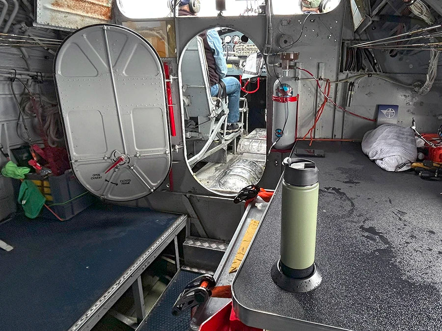Flat Mount attachable cup holder in a WWII PBY Catalina aircraft with a TwistLock green insulated stainless steel canteen.