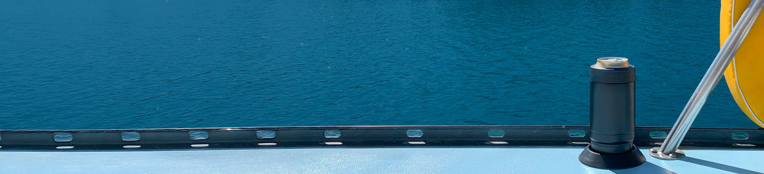 Best seller collection hero for desktop featuring an insulated TwistLock Can Cooler locked into the attachable flat mount cup holder on a sailboat.