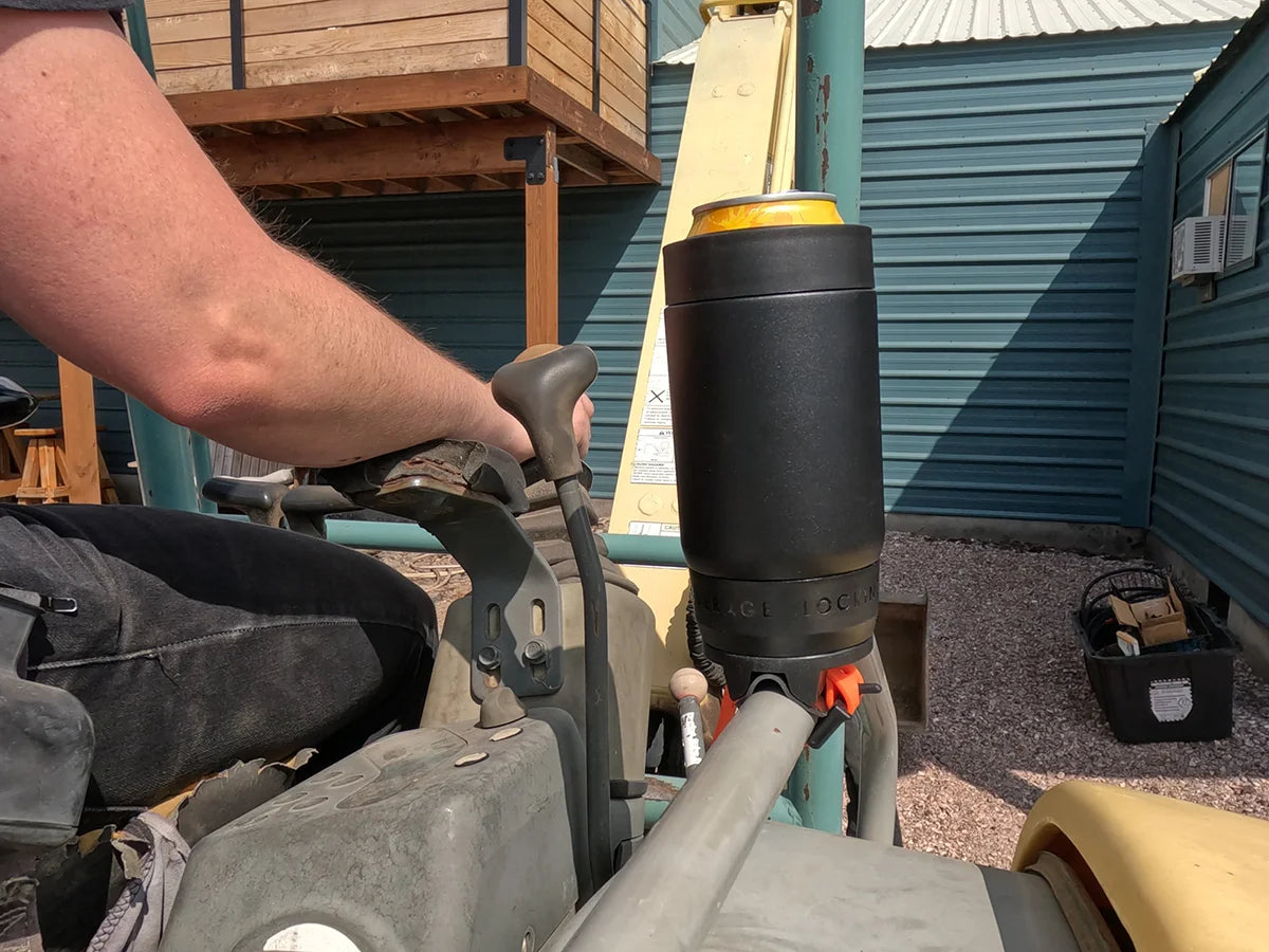 TwistLock Can Cooler and Bar Mount Attachable Cup Holder on the grab handle of a excavator.