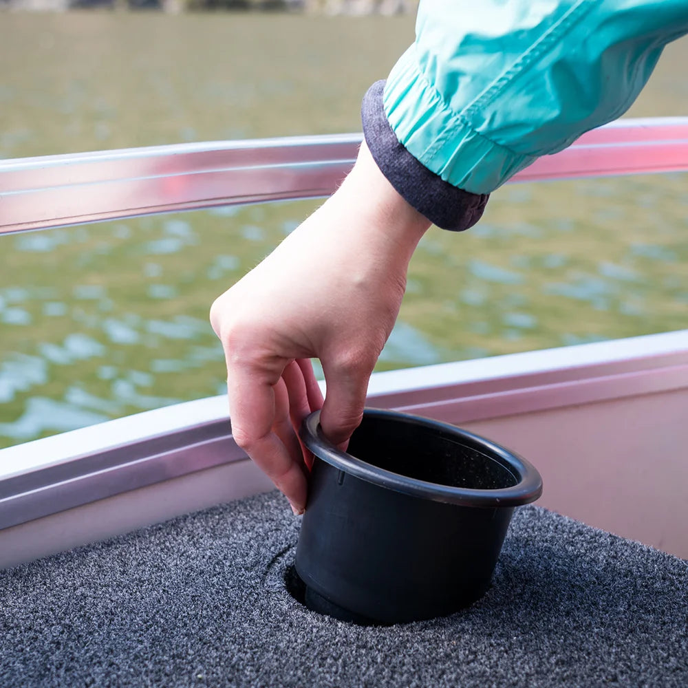 Images showing putting in the recessed drop in cup holder step 2.