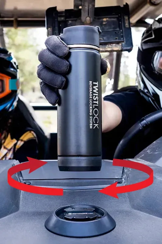 A side-by-side driver locking in his stainless steel TwistLock Canteen into a Flat Mount.