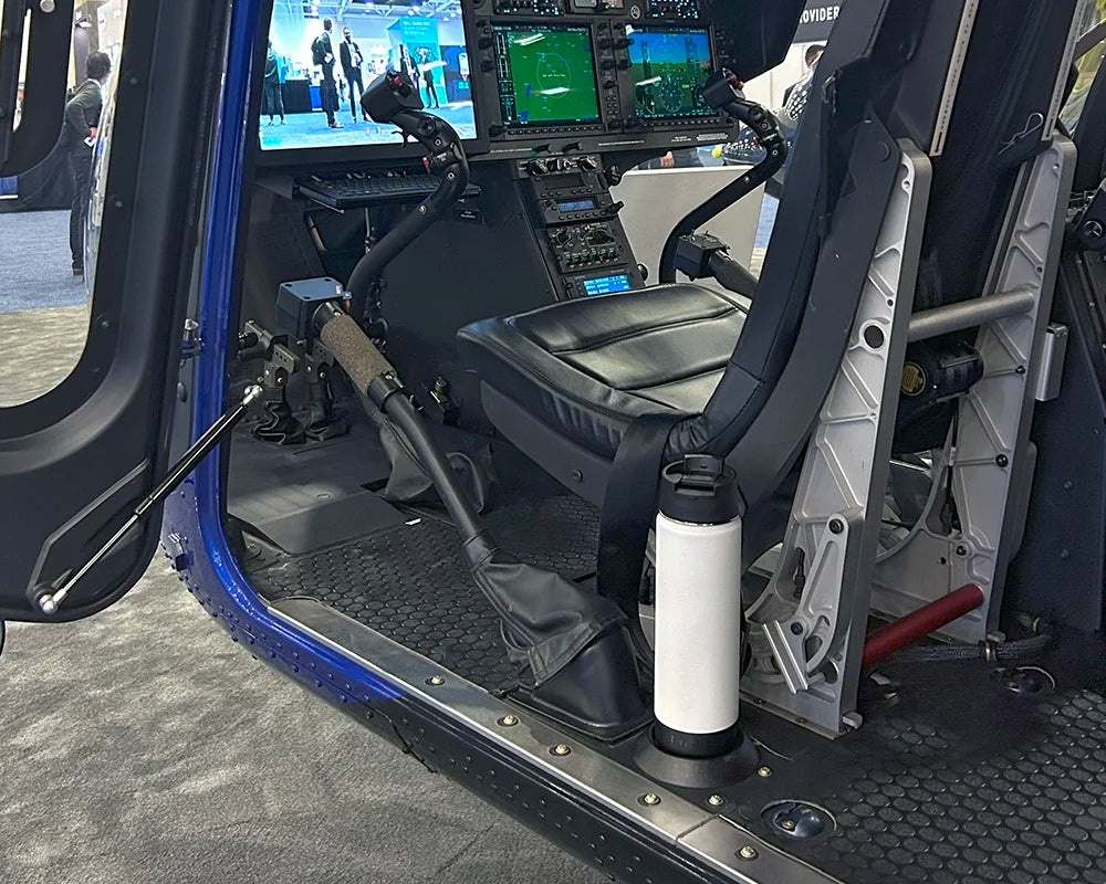 Bell 505 Helicopter with a TwistLock Flat Mount Cup Holder attached and Insulated White Canteen locked securely in.
