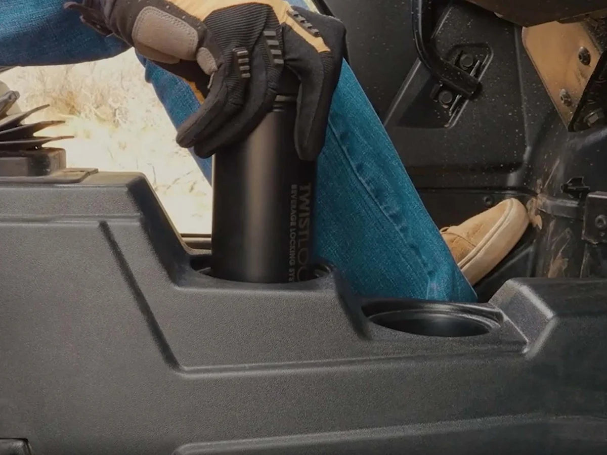 Offroad Side by Side (SxS) UTV with Attachable Secure TwistLock Cup Holder (Mini Disc) and insulated canteen being locked in the mount.