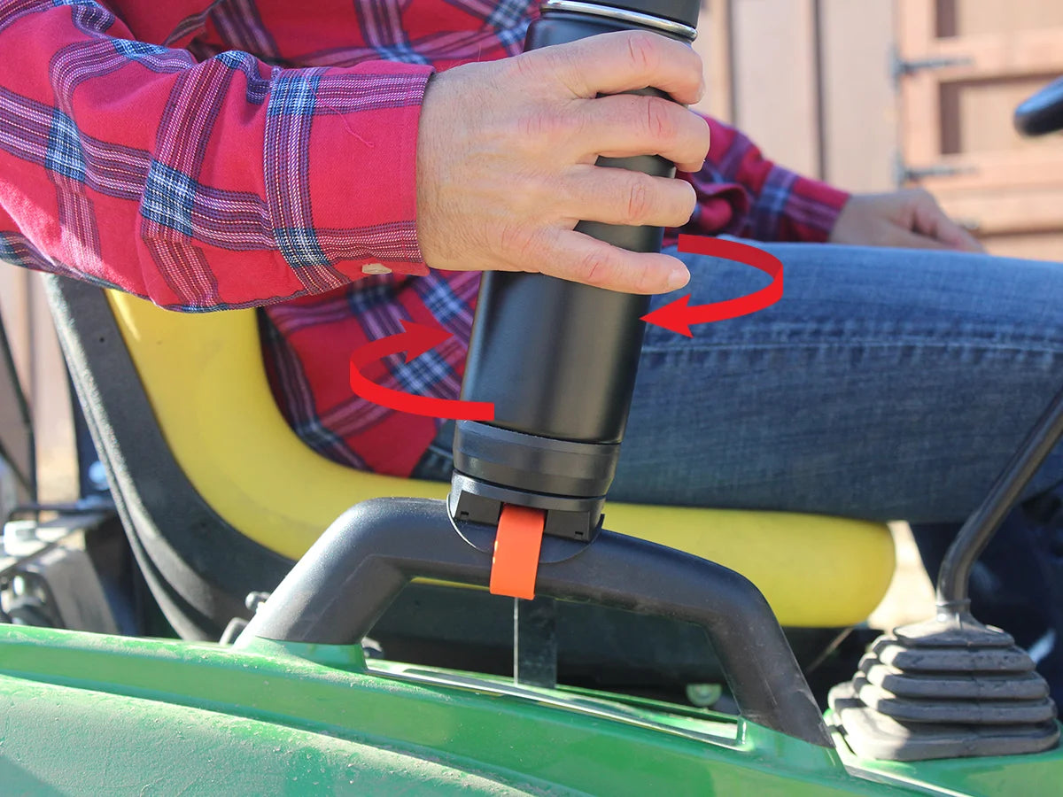 TwistLock Bar Mount attachable cup holder and canteen on a riding lawn mower tractor.