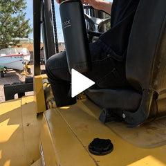 Showing a TwistLock Canteen being locked into the secure mini disc cup holder on the side of a forklift.