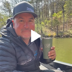 Professional Angler Fred Roumbanis showing his new signature series of TwistLock Beverage Locking System Vertical Mount Folding Cup Holder on his fishing boat. 